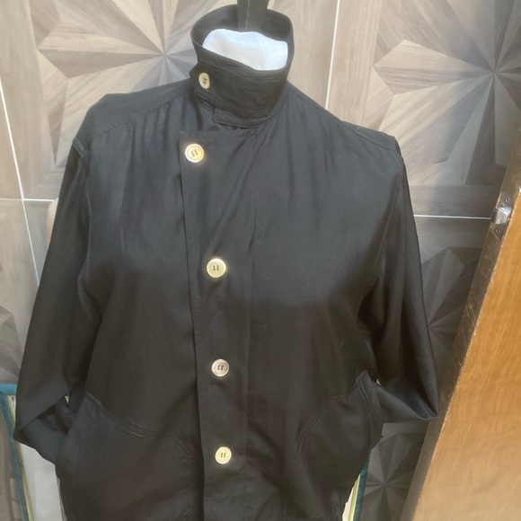 Black silk jacket pockets, abalone buttons, zipper and pleat in back. - Picture 4 of 5